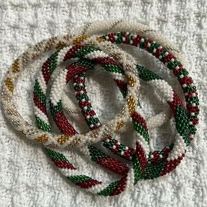 5 Sashka Co beaded bracelets, holiday red/green/white. Approx 8”.